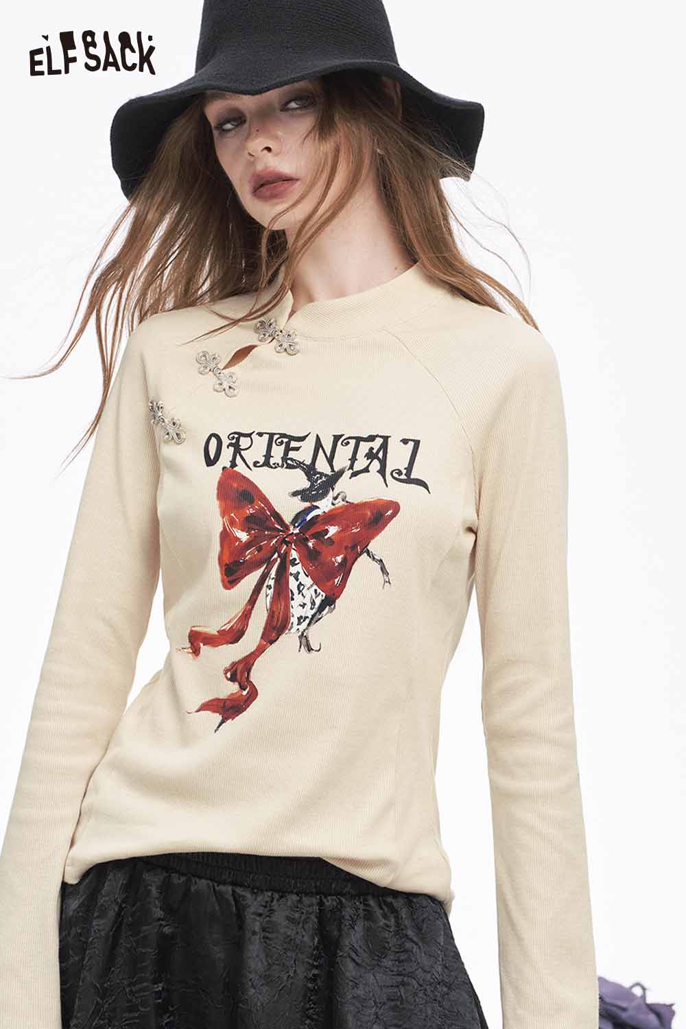 ELFSACK Soft Irregular Button Collar Bow Graphic Long Sleeve Tshirt