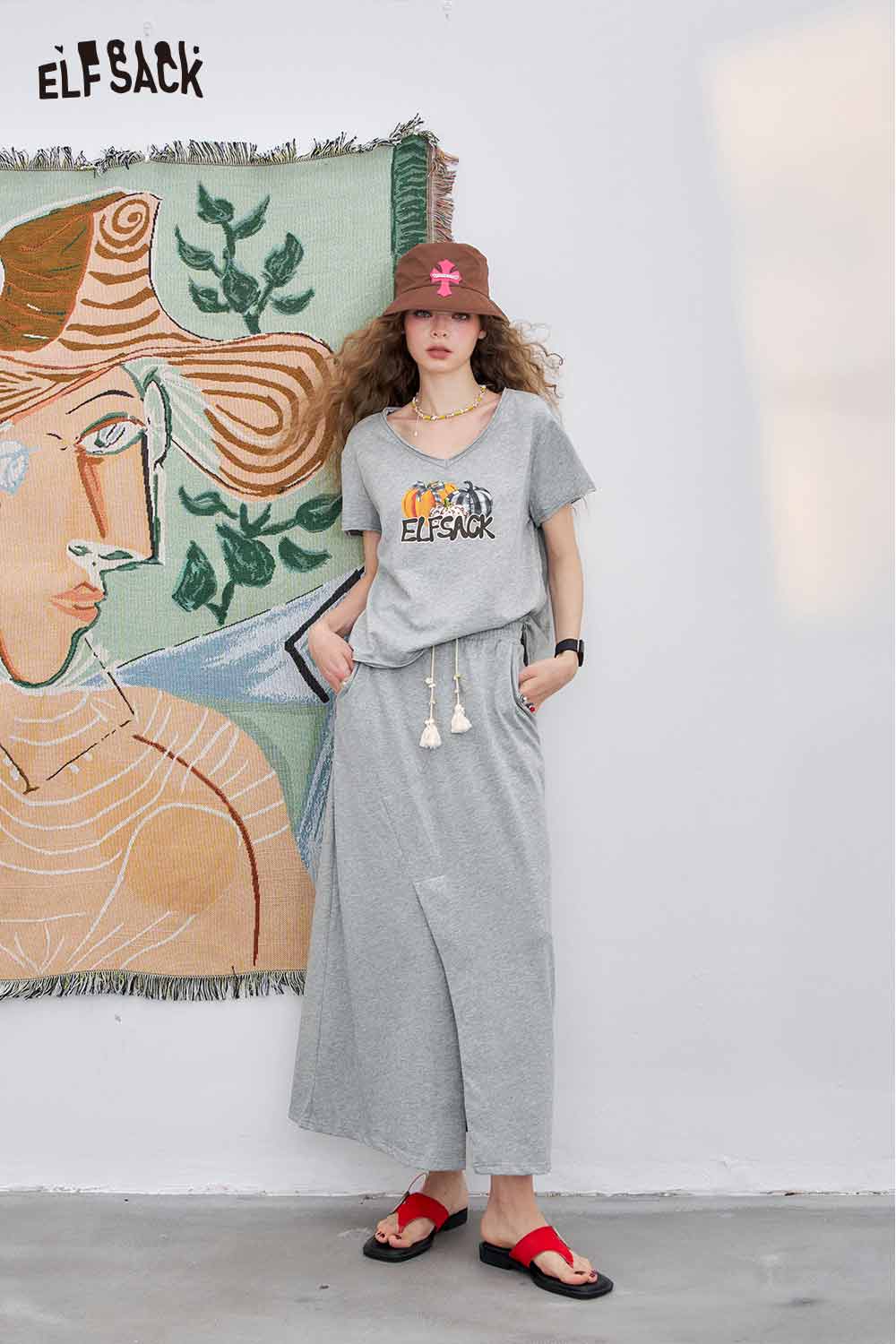 ELFSACK Cotton Spandex Blend High Slit Wrap Skirt and Oversized V-Neck Abstract Graphic Print Two Piece Coord Set