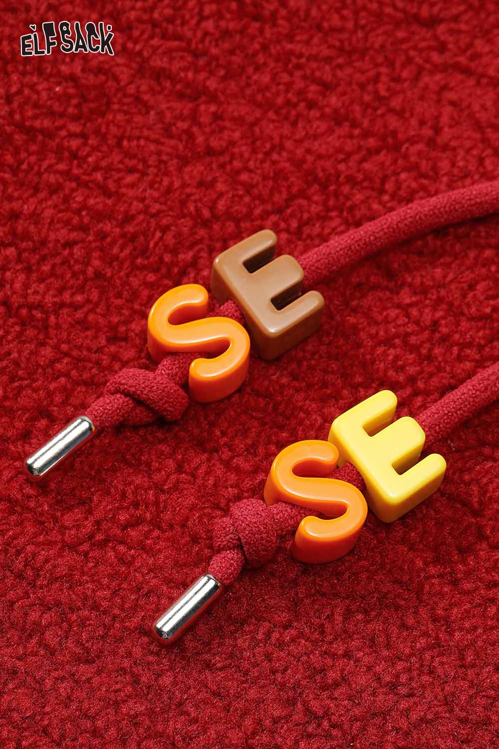 ELFSACK Casual Loose Solid Heart Embroidery Cropped Hoodie
