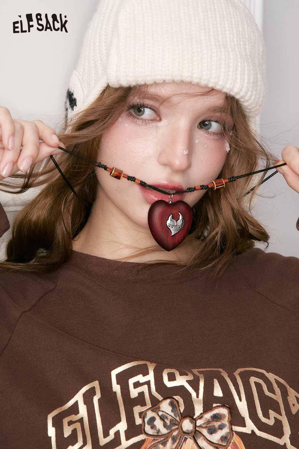 ELFSACK Vintage Redwood Heart Metal Inlay Handwoven Cord Sweater Chain Necklace