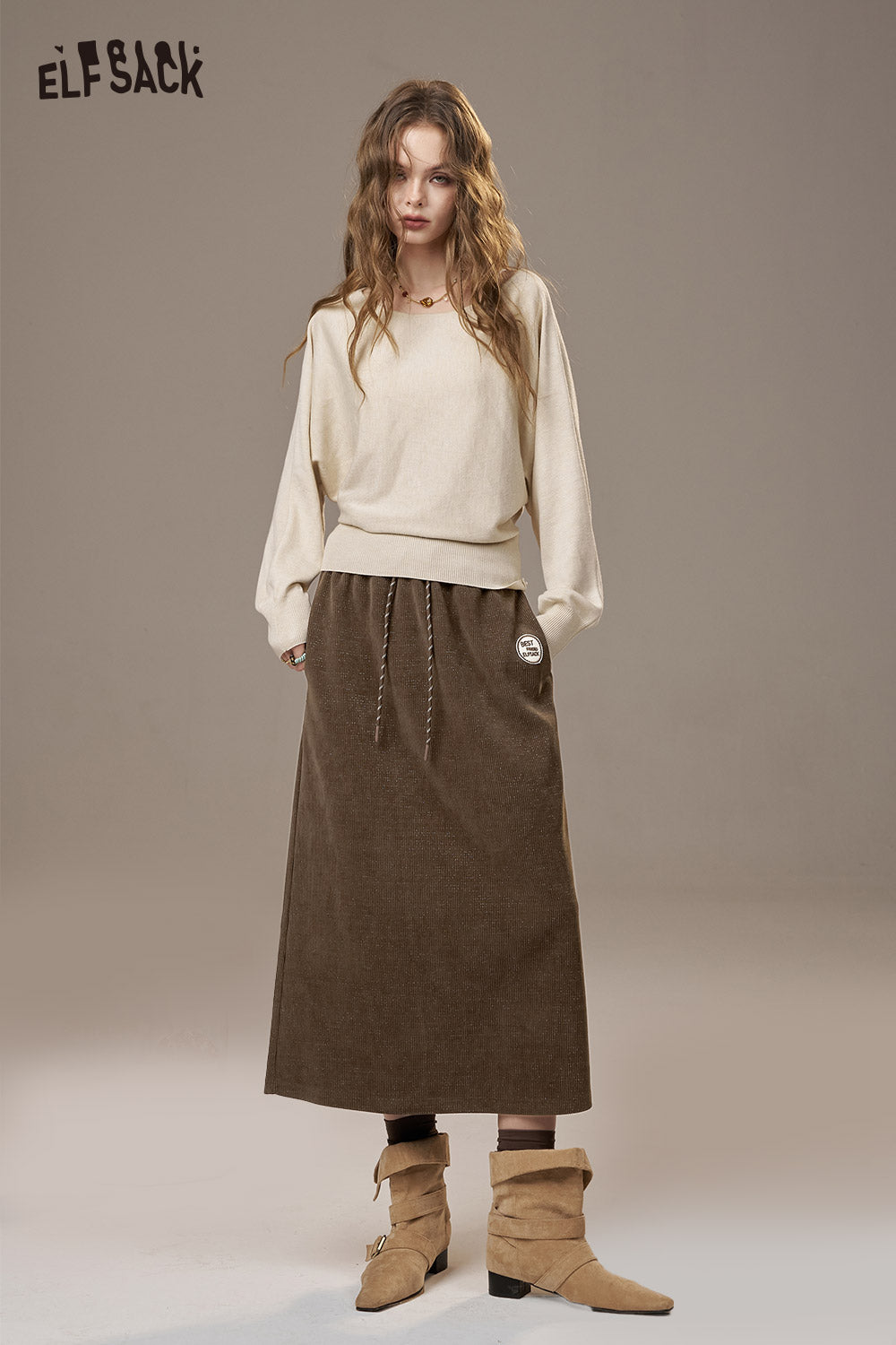ELFSACK Soft Textured Weave Mid Rise Solid Color Versatile Midi Skirt
