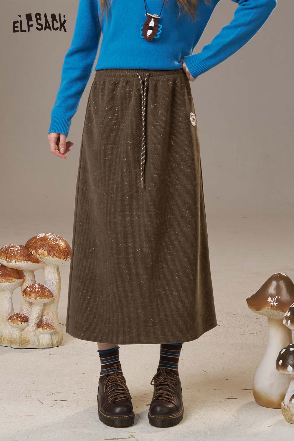 ELFSACK Soft Textured Weave Mid Rise Solid Color Versatile Midi Skirt
